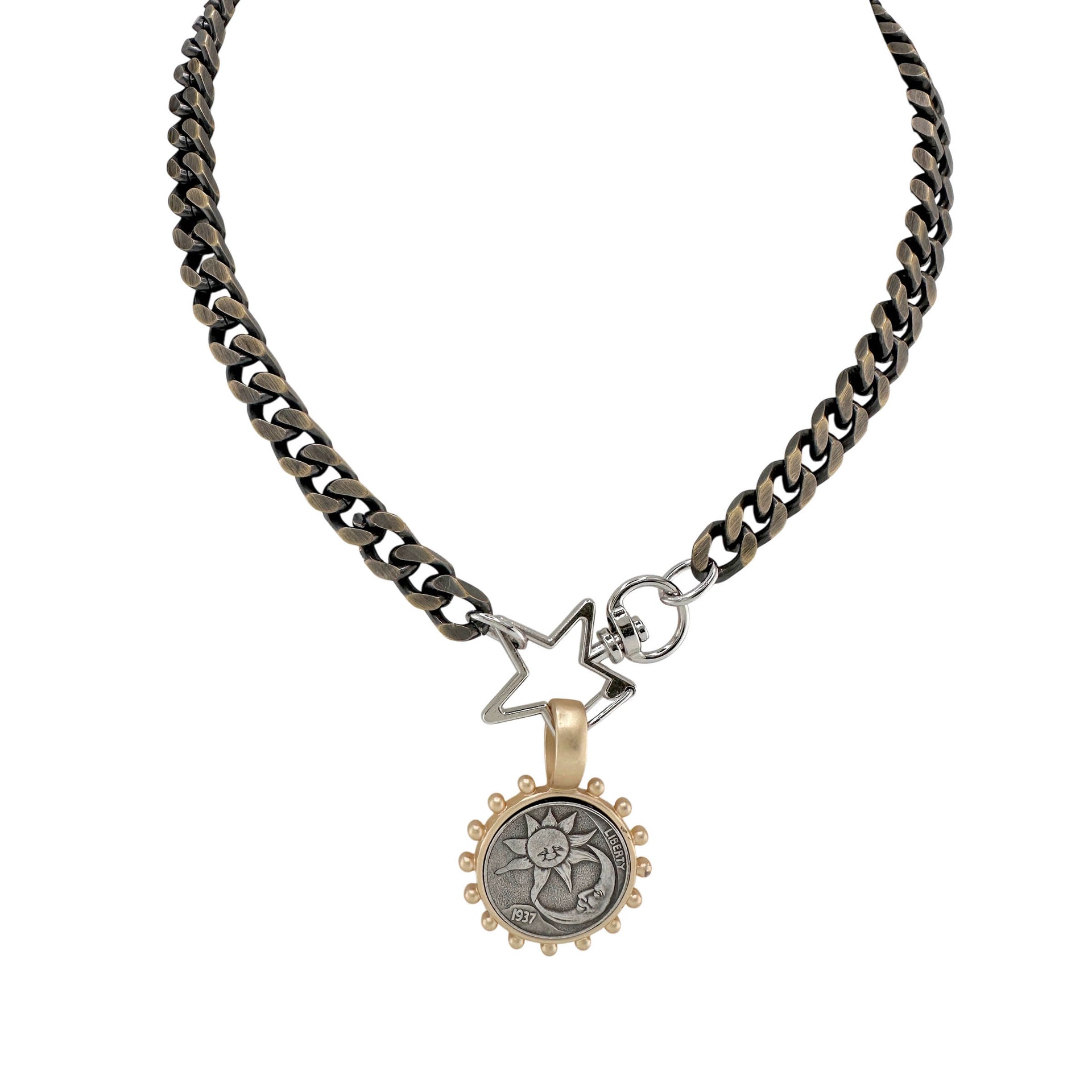 Necklace with star-shaped pendant and circular charm on a white background