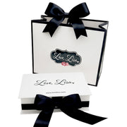 gift box and bag with ribbon styled as complete gift presentation