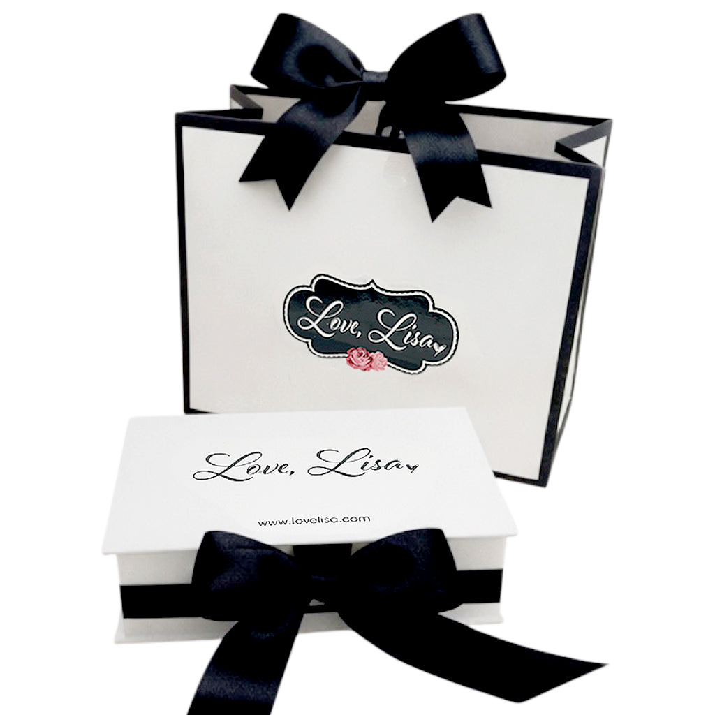 gift box and bag with ribbon styled as complete gift presentation