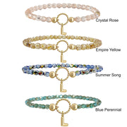 Four beaded bracelets with gold charms labeled 'Crystal Rose', 'Empire Yellow', 'Summer Song', and 'Blue Perennial' on a white background.