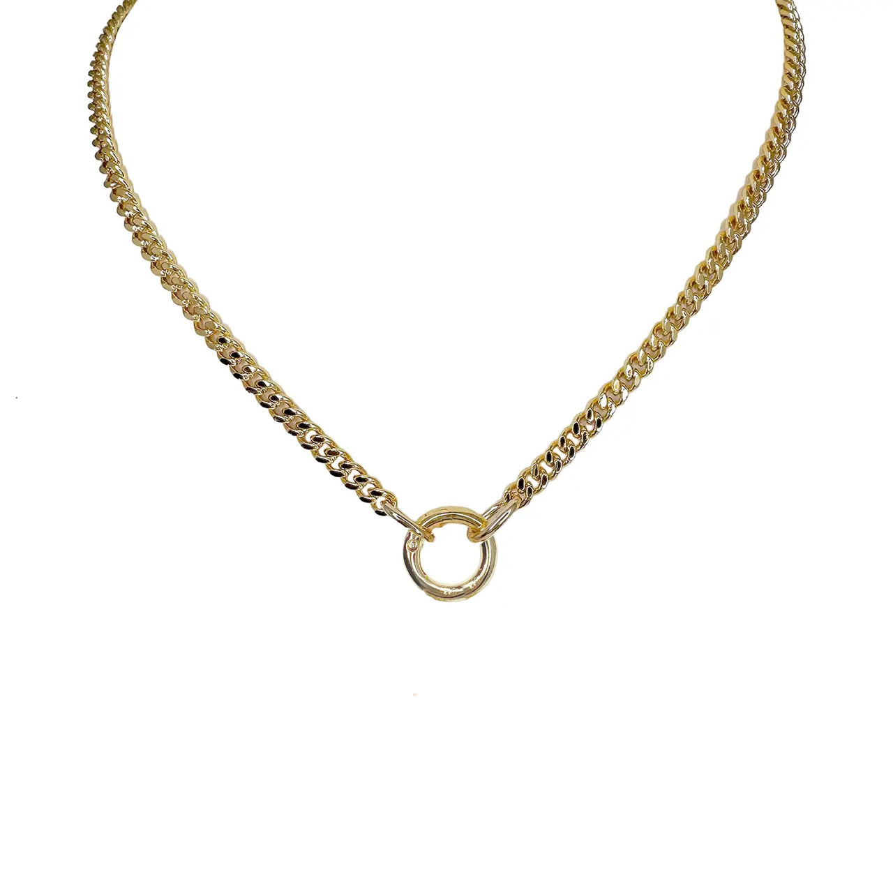 A silver curb chain necklace with a polished round clasp and three charms including a heart, a spiky heart, and a star.
