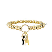 gold italian horn heart charm bracelet with black enamel horn pavé heart and mano cornuta on beaded stretch bracelet
