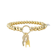 gold italian horn heart charm bracelet with gold pave horn pavé heart and mano cornuta on beaded stretch bracelet
