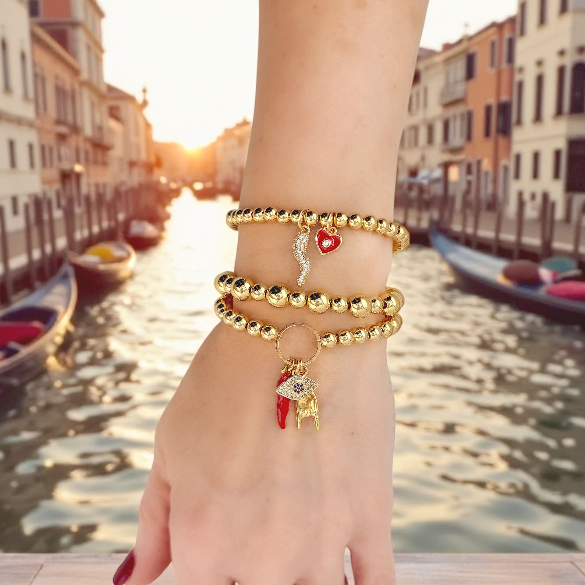 Love Lisa Italian protection bracelet stack worn layered with gold beaded charm bracelets