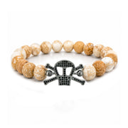 Marina Skull Gemstone Bracelet in Beige with sea sediment jasper beads and pavé skull centerpiece