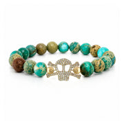 Marina Skull Gemstone Bracelet in Green with sea sediment jasper beads and pavé skull centerpiece