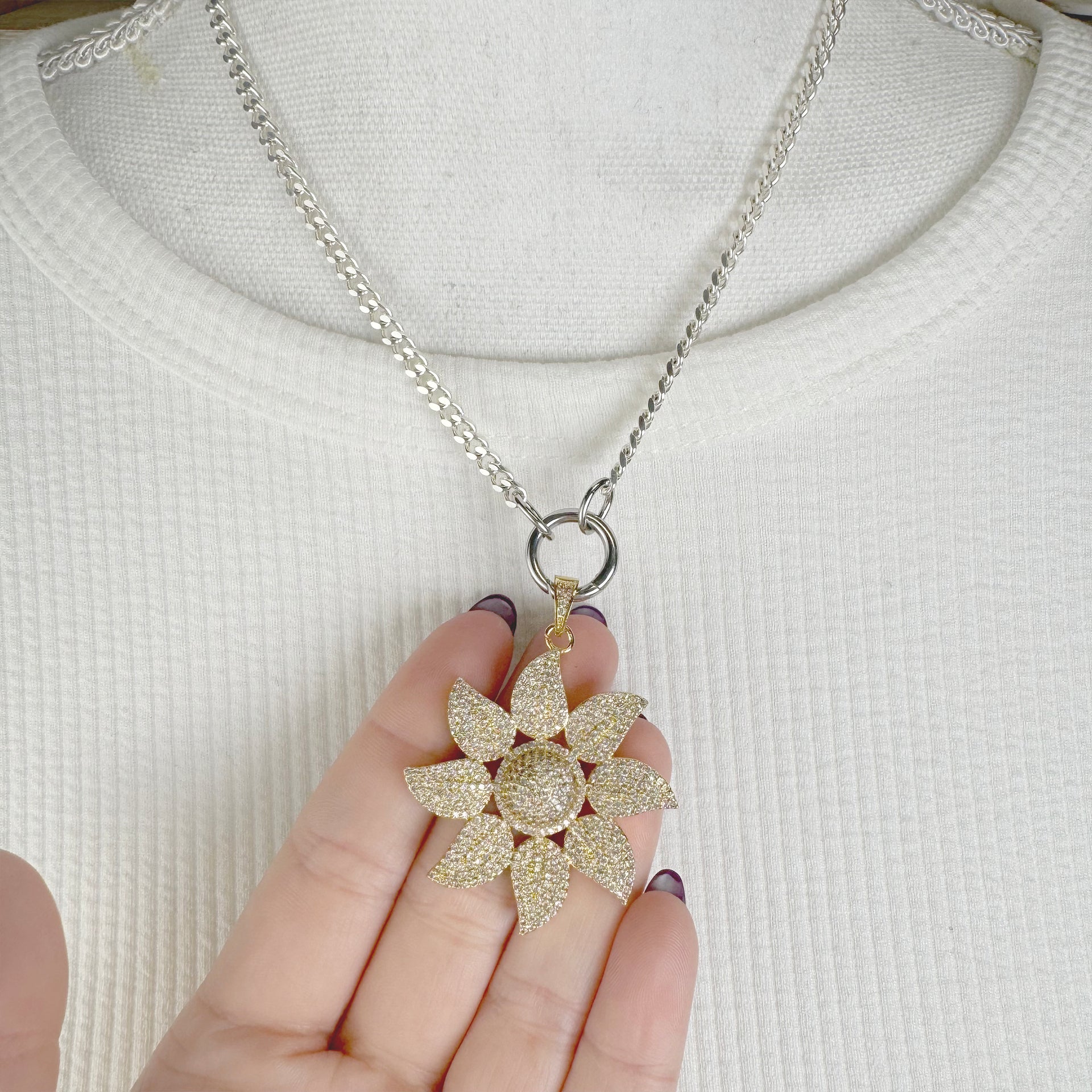 Love Lisa Mia Flower Charm gold pave floral pendant closeup model jewelry styling