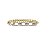 Bracelet with gold beads and silver chain links on a white background