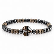 Mini Worry Stone Harper Luxe Crystal Rhythm Bracelet in Chrome with gray crystal beads, polished gunmetal beads, and dark mini heart worry stone