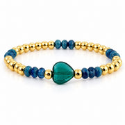 Mini Worry Stone Harper Luxe Crystal Rhythm Bracelet in Teal with teal crystal beads, polished gold beads, and teal mini heart worry stone