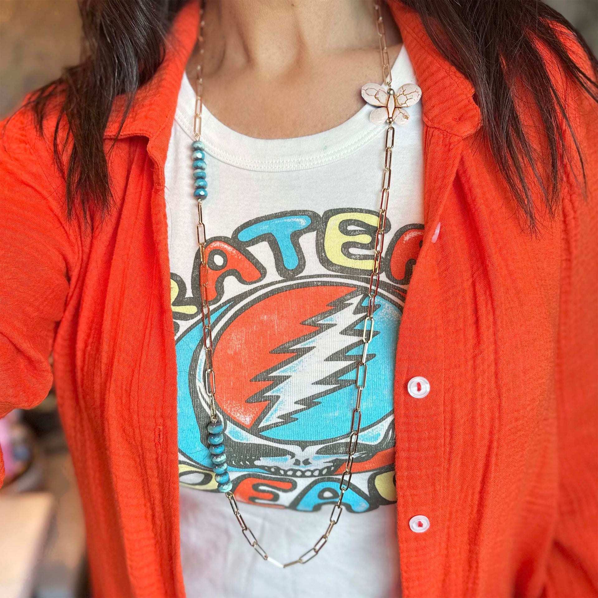 model wearing the monarch ivory turquoise necklace long