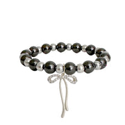 gunmetal and silver beaded bracelet with bow charm bold neutral jewelry for stacking