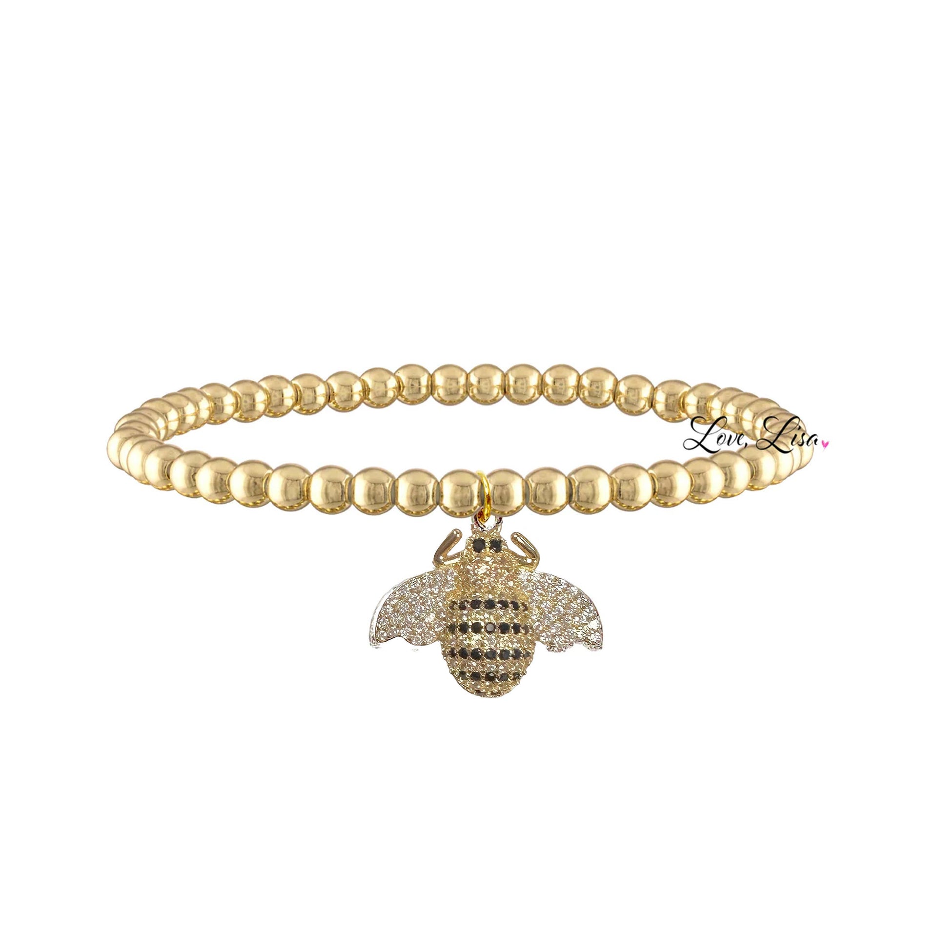 Gold beaded bracelet with a bee charm on a white background