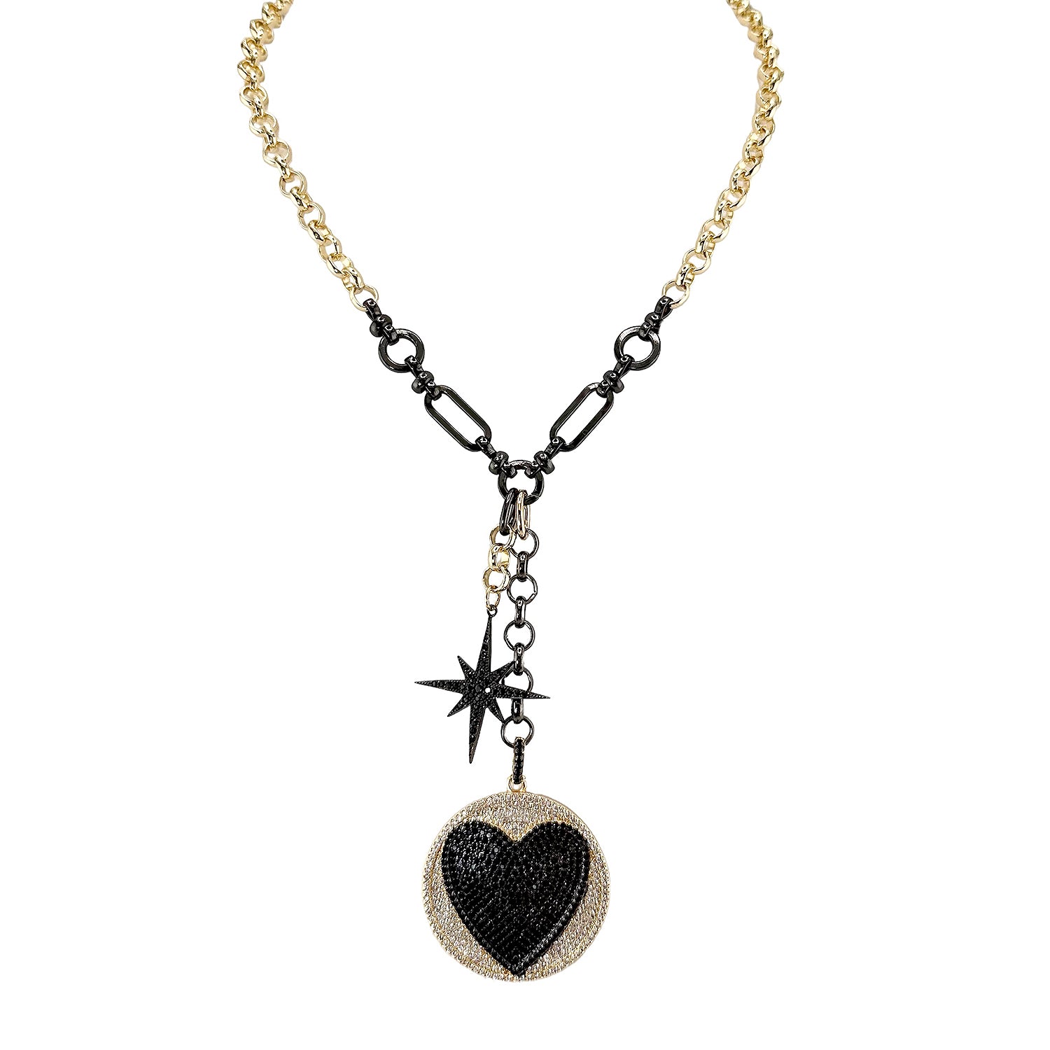 Lariat necklace with heart medallion and starburst charm in gold and gunmetal finish