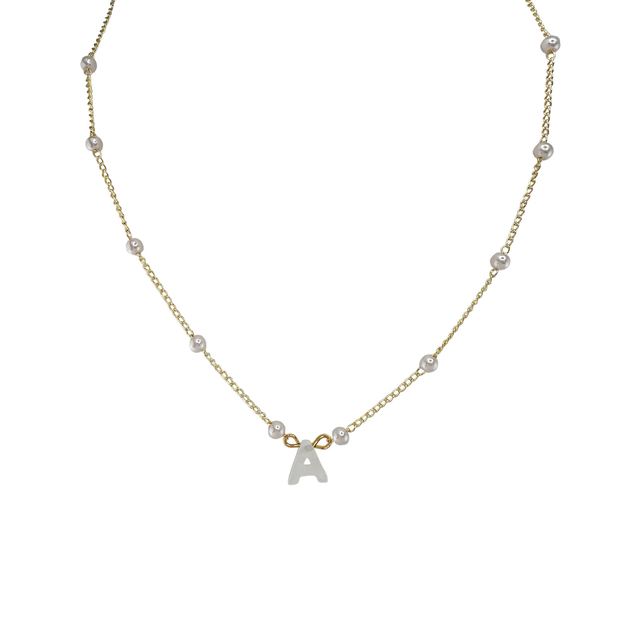 A pearl necklace with a gold chain and a silver initial charm in the shape of the letter 'A'.