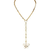 Gold chain necklace with a butterfly pendant on a white background