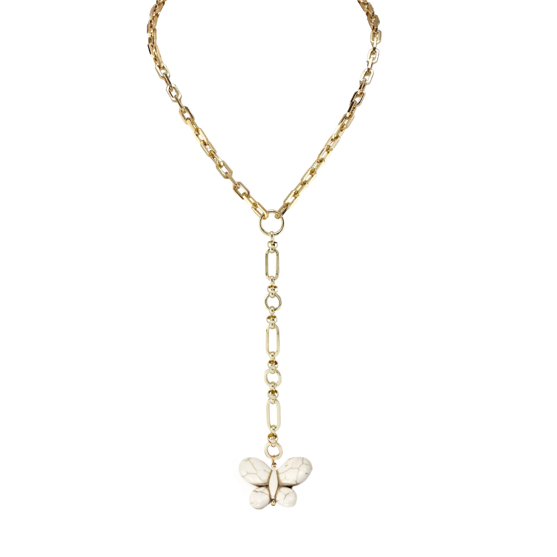 Gold chain necklace with a butterfly pendant on a white background