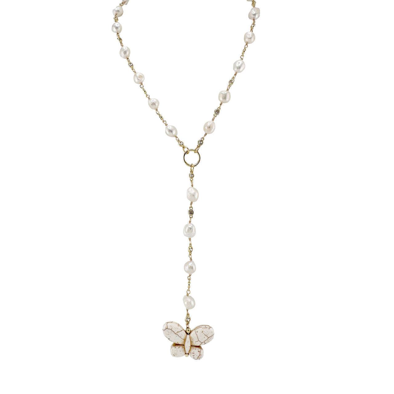 Pearl necklace with a butterfly pendant on a white background