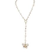Pearl necklace with a butterfly pendant on a white background