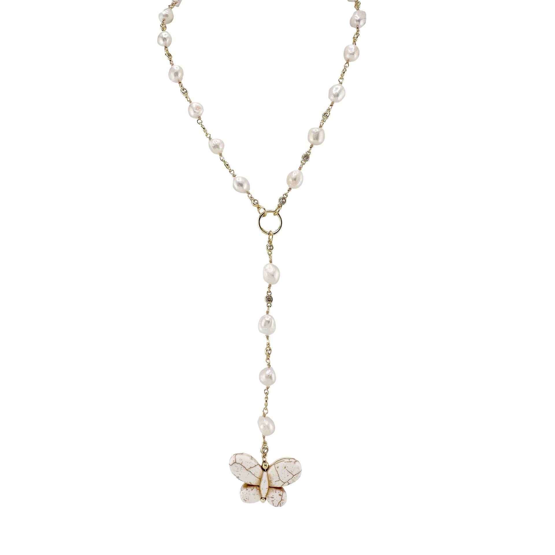 Pearl necklace with a butterfly pendant on a white background