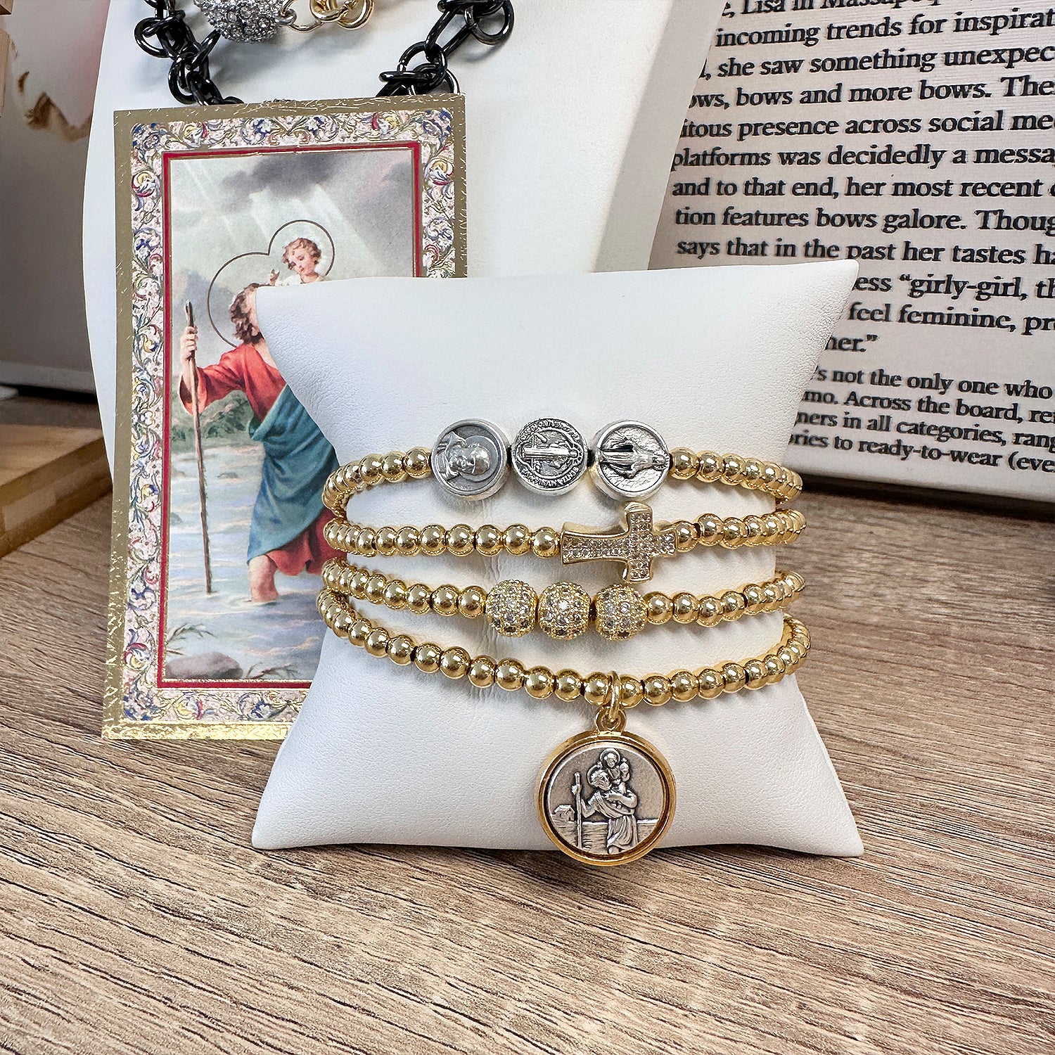 Myra's Religious Saint Stack featuring Saint Christopher, Padre Pio, and Miraculous Medals for spiritual protection and healing