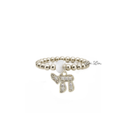 Noa Luxe Chai Stretch Ring in silver with polished 3mm beads pavé Chai charm and white bead accent
