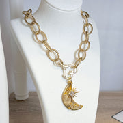 love lisa north star direction charm layered on chain necklace on display