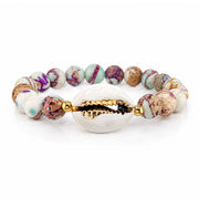 Ocean Tide Beaded Shell Bracelet in Seashell Cove with neutral pastel gemstone beads white shell centerpiece and gold accents
