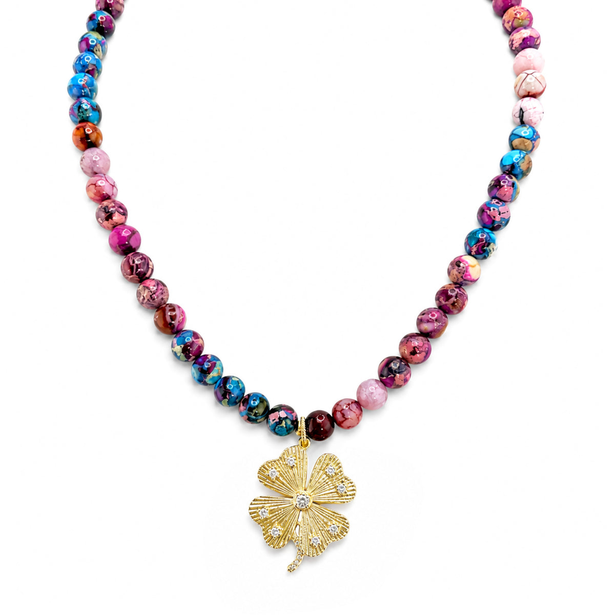 Paloma Lucky Clover Sea Sediment Jasper Necklace in Berry Blue with blue and pink stone beads and sparkling clover pendant