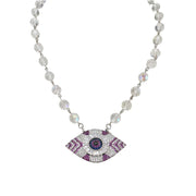 Necklace with a decorative eye pendant on a white background