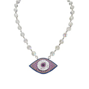 Necklace with a decorative evil eye pendant on a white background