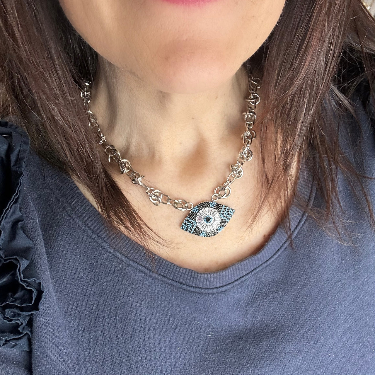 blue evil eye necklace worn by model