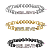 Three beaded bracelets with 'BELIEVE' in crystals on a white background, branded 'Lana'.