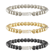 Three beaded bracelets in silver, gold, and black with a diamond-encrusted clasp on a white background.