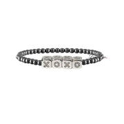 personalized small block letter bracelet in gunmetal with polished 4mm beads and petite silver letter cubes