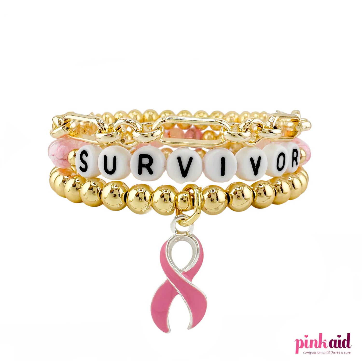 Bracelet with 'SURVIVOR' beads and pink ribbon charm on  white 