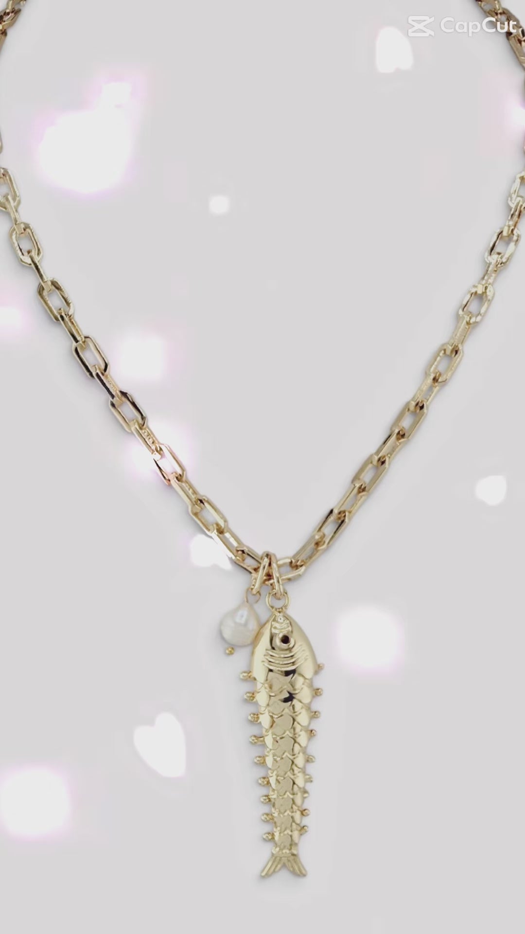 Love Lisa Maris Pearl Fish Charm Necklace shown with gold fish charm freshwater pearl accent and layering length options