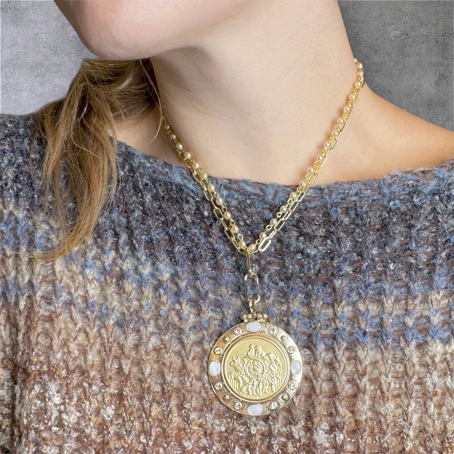 puppy love coin necklace gold double strand on model layered with other necklaces love lisa