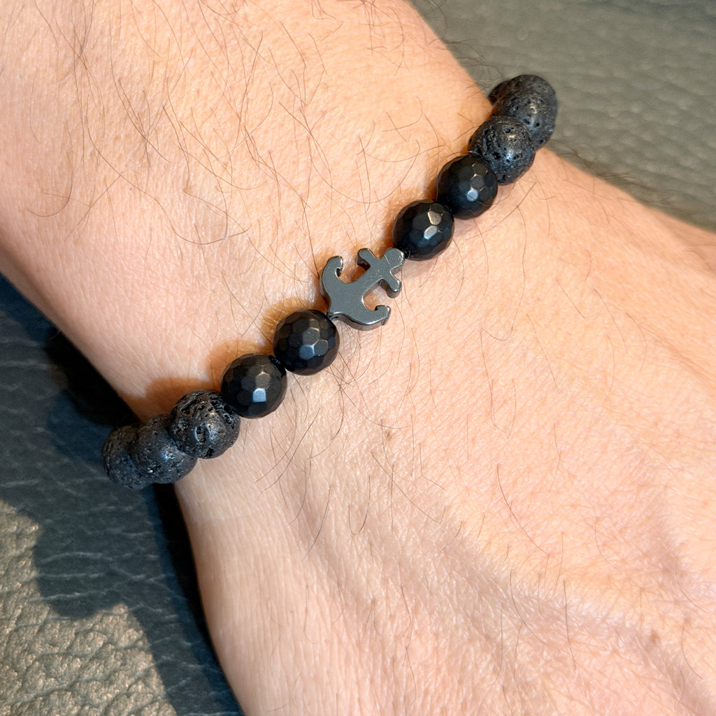 Love Lisa black anchor bracelet worn on wrist onyx lava bead stretch bracelet