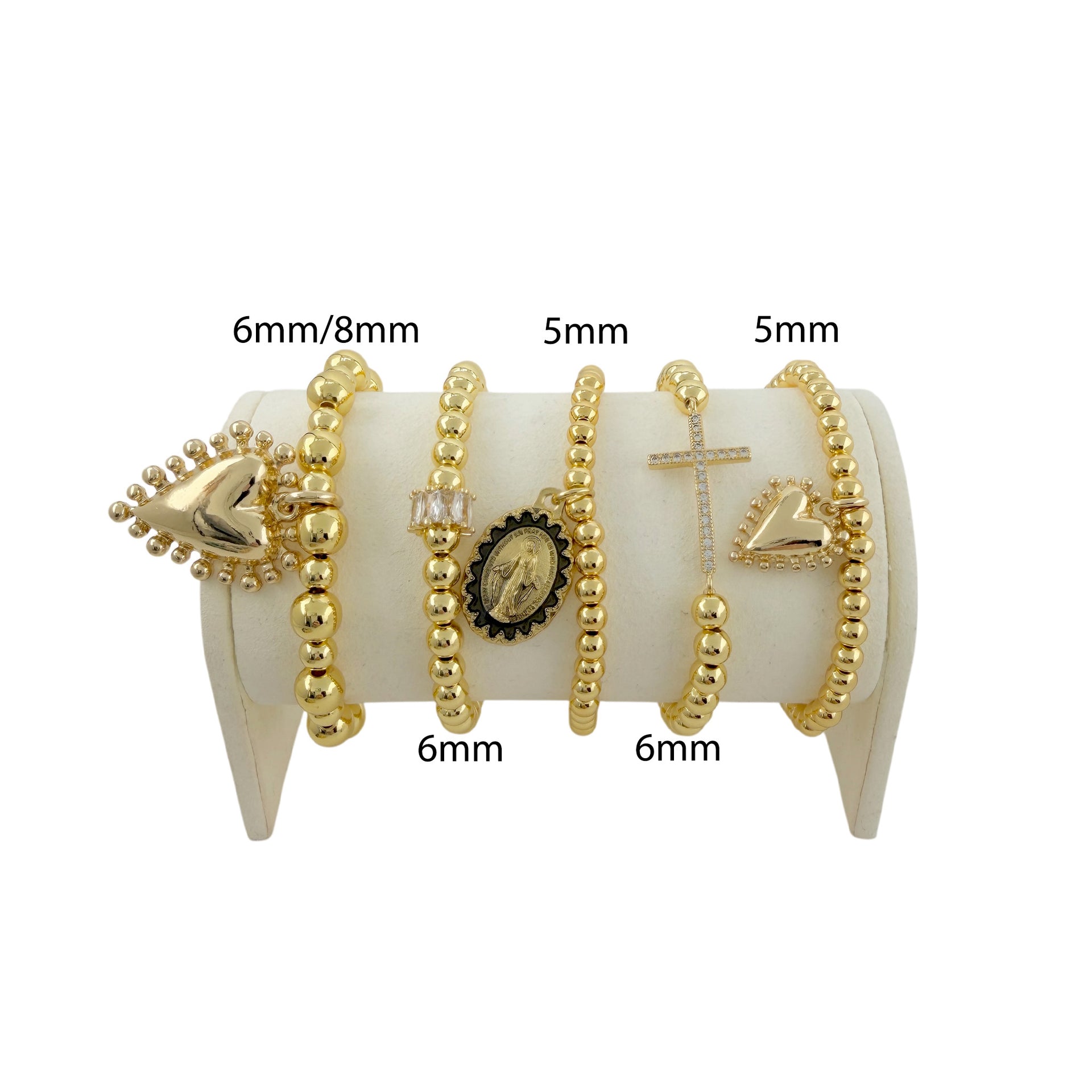 Love Lisa sacred heart blessed mother bracelet stack gold religious stretch bracelets display showing bead size and details of each bracelet in stack 
