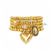 sacred heart blessed mother bracelet stack gold pavé cz cross sacred heart charms blessed mother medallion baguette ring and brass bead stretch bracelets