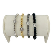 Saint Carlo Acutis faith stretch bracelet with metal or black onyx beads. Symbolic Catholic jewelry with prayer card. Meaningful gift for everyday wear.