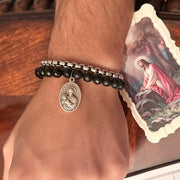 st. Caytano is the patron saint of job seekers.   This bracelet has a st. Caytano medal on it. 