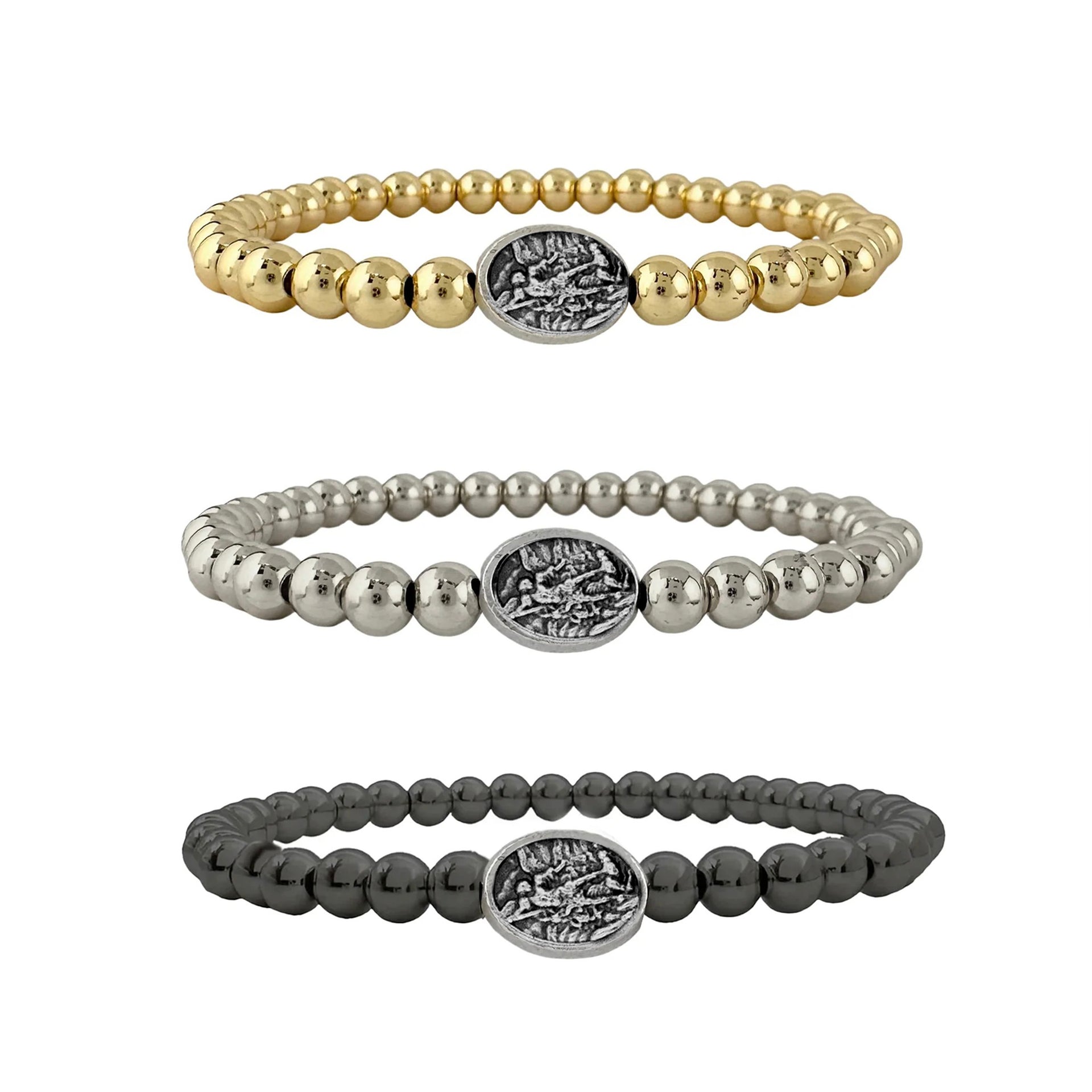 Three beaded bracelets with brass beads and central saint michael medal on a white background
