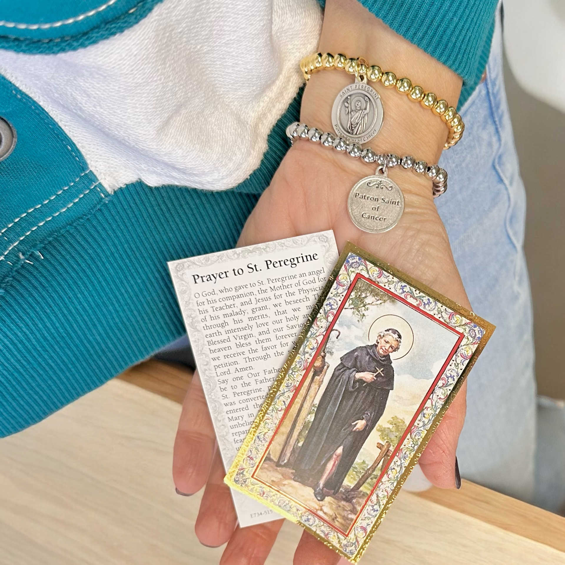 saint peregrine cancer bracelet worn on wrist healing faith jewelry
