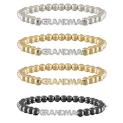 Set of four beaded bracelets with 'GRANDMA' on a white background