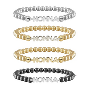 Set of four beaded bracelets with 'NONNA' on a white background