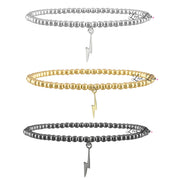 3mm beaded bracelet with lightning bolt charm shown in silver, gold and gunmetal