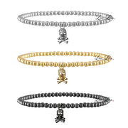 3mm beaded bracelet with skull charm shown in silver, gold and gunmetal