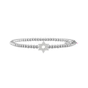 Silver bracelet with star design on a white background